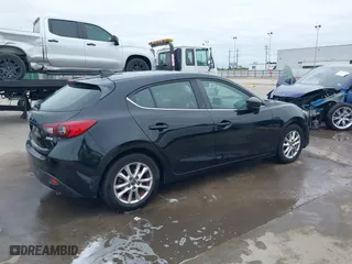 2016 Mazda Mazda3 i Grand Touring with VIN 3MZBM1N75GM267972, listed as a IAAI auction lot 41030060 with 86,065 mi miles. Bid and sale history available at carsss.com. Image 4.