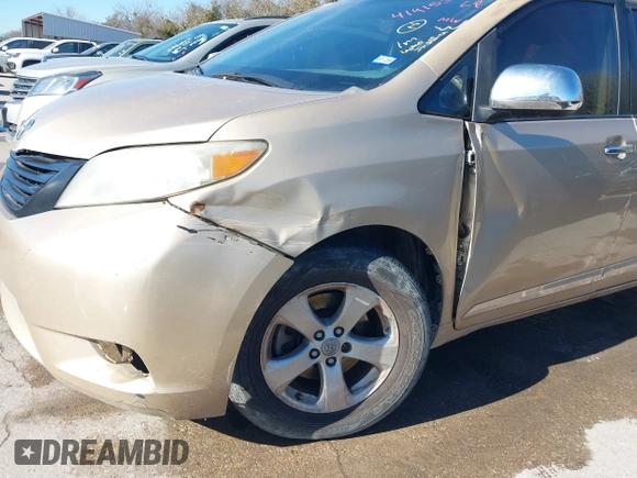 2012 Toyota Sienna with VIN 5TDKA3DC1CS011022, listed as a IAAI auction lot 41415386 with 209,552 mi miles and . Bid and sale history available at DreamBid. Image 6.