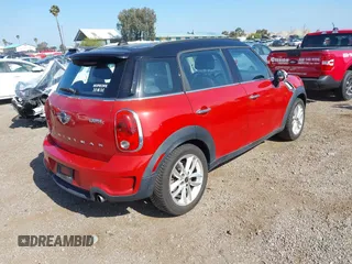 2013 MINI Countryman S z VIN WMWZC3C52DWP23887, wystawiony jako IAAI lot #42278143 z przebiegiem 63 625 mil mil oraz . Historia ofert i sprzedaży dostępna na DreamBid. Obrazek 4.