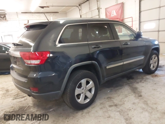 2012 Jeep Grand Cherokee Laredo with VIN 1C4RJFAG5CC351539, listed as a IAAI auction lot 41861533 with 166,909 mi miles. Bid and sale history available at carsss.com. Image 4.