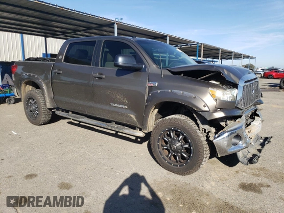 2012 Toyota Tundra 4WD Truck with VIN 5TFDW5F18CX256122, listed as a Copart auction lot 47142355 with 194,668 mi miles and Salvage Title. Bid and sale history available at carsss.com. Image 4.