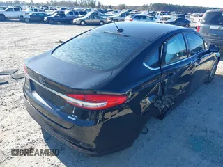 2017 Ford Fusion SE with VIN 3FA6P0HD9HR137825, listed as a IAAI auction lot 41737647 with 128,545 mi miles and . Bid and sale history available at DreamBid. Image 6.
