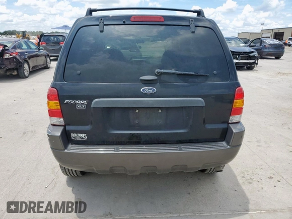 2004 Ford Escape XLT z VIN 1FMYU03124KB41332, wystawiony jako Copart lot #62335725 z przebiegiem Nie podano mil oraz Czysty tytuł • Clean title. Historia ofert i sprzedaży dostępna na DreamBid. Obrazek 6.