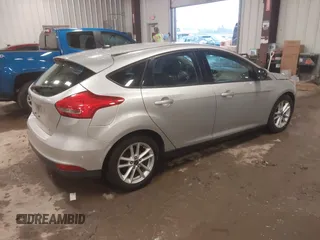 2015 Ford Focus SE with VIN 1FADP3K29FL328611, listed as a IAAI auction lot 41669844 with 136,666 mi miles. Bid and sale history available at carsss.com. Image 4.