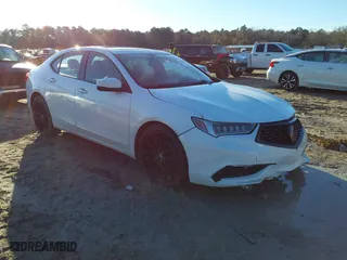 2018 Acura TLX with VIN 19UUB1F38JA010436, listed as a IAAI auction lot 41427102 with 116,912 mi miles. Bid and sale history available at carsss.com. Image 1.
