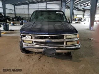 1999 Chevrolet Suburban with VIN 3GNEC16R5XG218523, listed as a Copart auction lot 72568494 with 297,020 mi miles and Salvage Title. Bid and sale history available at carsss.com. Image 5.
