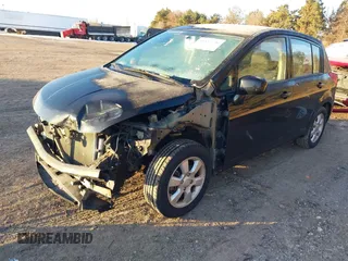 2011 Nissan Versa 1.8 S with VIN 3N1BC1CP0BL403757, listed as a IAAI auction lot 41437726 with 154,834 mi miles. Bid and sale history available at carsss.com. Image 2.