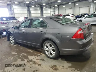 2012 Ford Fusion SE with VIN 3FAHP0HG9CR323277, listed as a Copart auction lot 59501005 with 84,658 mi miles and Salvage title. Bid and sale history available at DreamBid. Image 2.