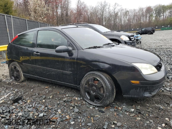2005 Ford Focus with VIN 3FAHP31N65R146202, listed as a Copart auction lot 50226415 with 184,919 mi miles and Salvage title. Bid and sale history available at DreamBid. Image 4.