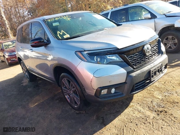 2021 Honda Passport EX-L with VIN 5FNYF8H54MB042677, listed as a IAAI auction lot 40732860 with 63,698 mi miles. Bid and sale history available at carsss.com. Image 1.