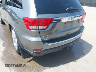 2013 Jeep Grand Cherokee Overland with VIN 1C4RJFCG2DC611877, listed as a IAAI auction lot 41910800 with 151,457 mi miles. Bid and sale history available at carsss.com. Image 6.