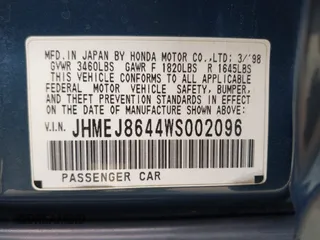 1998 Honda Civic EX with VIN JHMEJ8644WS002096, listed as a IAAI auction lot 41828342 with 184,283 mi miles. Bid and sale history available at carsss.com. Image 9.