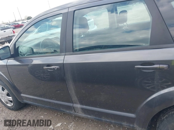 2014 Dodge Journey SE with VIN 3C4PDCAB1ET219760, listed as a IAAI auction lot 42013441 with 106,212 mi miles and . Bid and sale history available at carsss.com. Image 15.