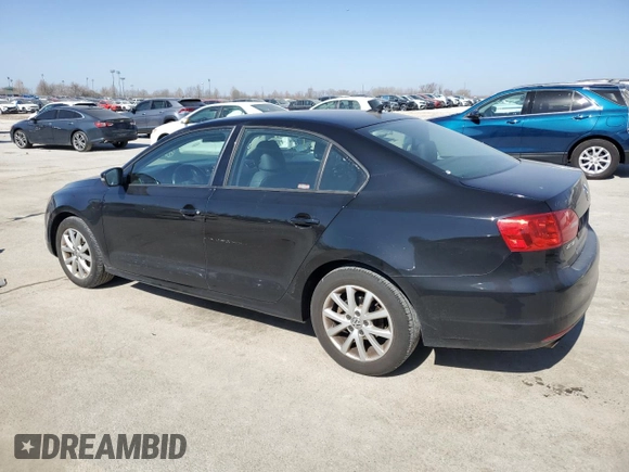 2012 Volkswagen Jetta Sedan SE w/Convenience with VIN 3VWDX7AJ2CM411783, listed as a Copart auction lot 48974555 with 128,209 mi miles and Salvage Title. Bid and sale history available at carsss.com. Image 2.