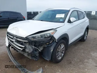 2016 Hyundai Tucson Sport with VIN KM8J33A2XGU242256, listed as a IAAI auction lot 41065573 with 97,503 mi miles. Bid and sale history available at carsss.com. Image 2.