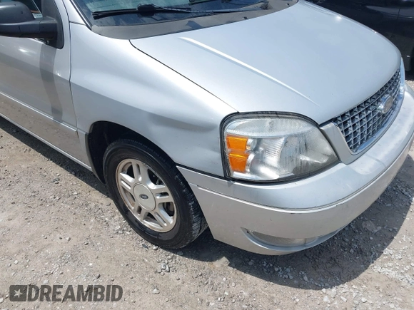 2007 Ford Freestar SEL z VIN 2FMZA52217BA00979, wystawiony jako IAAI lot #42151101 z przebiegiem 112 806 mil mil oraz . Historia ofert i sprzedaży dostępna na DreamBid. Obrazek 6.