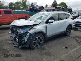 2018 Honda CR-V Touring with VIN 2HKRW2H91JH689748, listed as a Copart auction lot 56923795 with 93,299 mi miles and Salvage title. Bid and sale history available at DreamBid. Image 1.