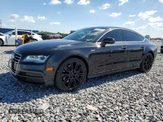 2013 Audi A7 Prestige с VIN WAU2GAFC7DN062352, выставлен на аукционе Copart как лот 61147015 с пробегом 119 527 миль миль и Списание • Salvage title. История ставок и продаж доступна на DreamBid. Изображение 1.