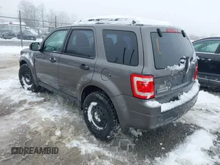 2012 Ford Escape XLS z VIN 1FMCU9C72CKA10130, wystawiony jako IAAI lot #41543233 z przebiegiem 168 552 mil mil oraz . Historia ofert i sprzedaży dostępna na DreamBid. Obrazek 3.
