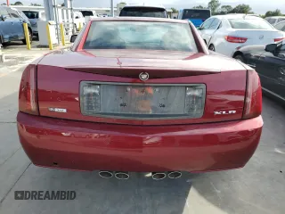 2007 Cadillac XLR z VIN 1G6YV36A575601135, wystawiony jako Copart lot #75123444 z przebiegiem Nie podano mil oraz Szkody całkowita. Historia ofert i sprzedaży dostępna na DreamBid. Obrazek 6.