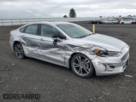 2019 Ford Fusion Titanium with VIN 3FA6P0D99KR242616, listed as a Copart auction lot 57525635 with 79,518 mi miles and Salvage title. Bid and sale history available at DreamBid. Image 4.