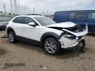 2023 Mazda CX-30 S Select with VIN 3MVDMBBM2PM555443, listed as a Copart auction lot 58159865 with 30,118 mi miles and Salvage title. Bid and sale history available at DreamBid. Image 4.