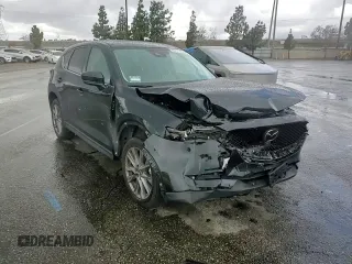 2020 Mazda CX-5 Grand Touring with VIN JM3KFADM3L0815055, listed as a Copart auction lot 48175245 with 56,602 mi miles and Salvage Title. Bid and sale history available at carsss.com. Image 11.