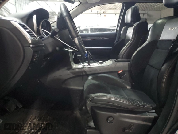 2012 Jeep Grand Cherokee SRT8 with VIN 1C4RJFDJ7CC187475, listed as a Copart auction lot 45191285 with 133,748 mi miles and Salvage Title. Bid and sale history available at carsss.com. Image 7.