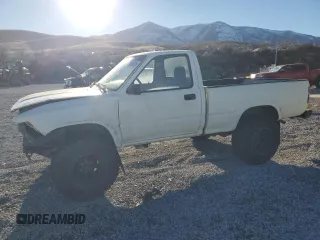 1993 Toyota Pickup DX with VIN JT4RN01P8P7061571, listed as a Copart auction lot 87635205 with 188,915 mi miles and Salvage title. Bid and sale history available at DreamBid. Image 1.