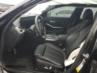 2023 BMW 3 Series 330i with VIN 3MW69FF02P8D60443, listed as a Copart auction lot 43405365 with 0 mi miles and Salvage Title. Bid and sale history available at carsss.com. Image 7.