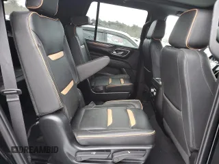 2023 GMC Yukon AT4 with VIN 1GKS2CKDXPR212872, listed as a Copart auction lot 43956265 with 74,656 mi miles and Salvage Title. Bid and sale history available at carsss.com. Image 11.