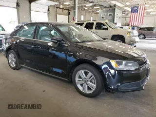 2014 Volkswagen Jetta Hybrid SE z VIN 3VW637AJ2EM288509, wystawiony jako Copart lot #61716065 z przebiegiem 116 461 mil mil oraz Czysty tytuł • Clean title. Historia ofert i sprzedaży dostępna na DreamBid. Obrazek 4.