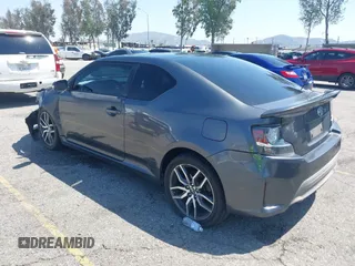 2015 Scion tC with VIN JTKJF5C74F3090309, listed as a IAAI auction lot 41988036 with 158,240 mi miles. Bid and sale history available at carsss.com. Image 3.