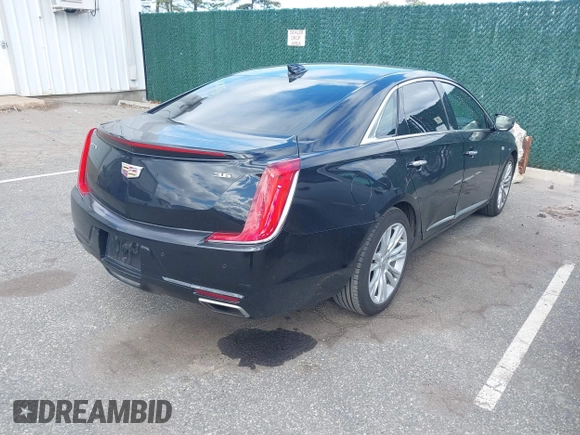 2019 Cadillac XTS Luxury with VIN 2G61M5S3XK9149766, listed as a IAAI auction lot 42065284 with 82,096 mi miles and . Bid and sale history available at carsss.com. Image 4.