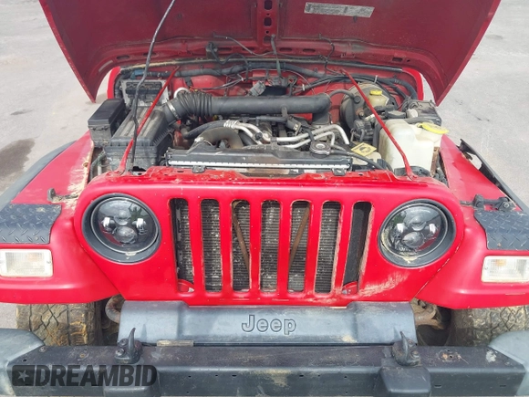 2001 Jeep Wrangler Sport z VIN 1J4FA49S31P335680, wystawiony jako IAAI lot #42471312 z przebiegiem 212 927 mil mil oraz . Historia ofert i sprzedaży dostępna na DreamBid. Obrazek 10.
