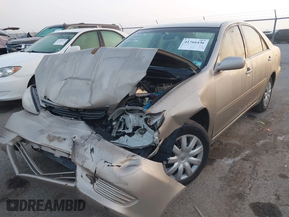 2005 Toyota Camry STD with VIN 4T1BE32K55U019844, listed as a IAAI auction lot 41766436 with 203,251 mi miles and . Bid and sale history available at DreamBid. Image 2.