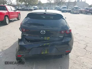 2023 Mazda 3 Premium Plus z VIN JM1BPBNY0P1615814, wystawiony jako IAAI lot #41718577 z przebiegiem Nie podano mil oraz . Historia ofert i sprzedaży dostępna na DreamBid. Obrazek 16.