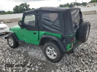 2004 Jeep Wrangler SE with VIN 1J4FA29124P769475, listed as a Copart auction lot 64371244 with 136,877 mi miles and Salvage title. Bid and sale history available at DreamBid. Image 2.