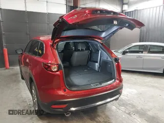 2023 Mazda CX-9 Signature z VIN JM3TCBEY4P0634153, wystawiony jako IAAI lot #42132856 z przebiegiem 25 131 mil mil oraz . Historia ofert i sprzedaży dostępna na DreamBid. Obrazek 3.