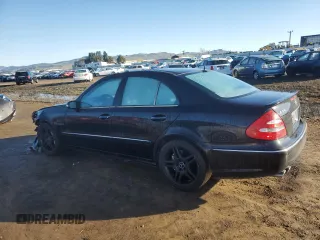 2003 Mercedes-Benz E-Class 5.5L AMG with VIN WDBUF76J73A364731, listed as a Copart auction lot 87019114 with 187,696 mi miles and Salvage Title. Bid and sale history available at carsss.com. Image 2.