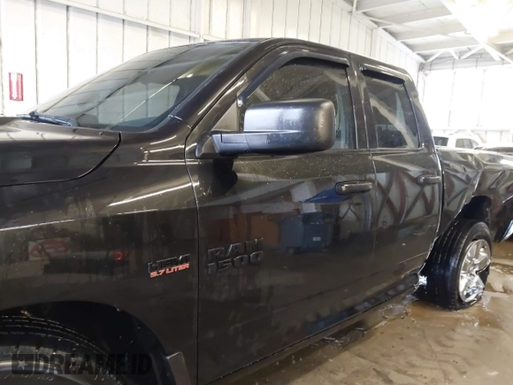 2015 Ram 1500 Express with VIN 1C6RR7FT5FS718011, listed as a IAAI auction lot 41556934 with 164,266 mi miles and . Bid and sale history available at DreamBid. Image 13.