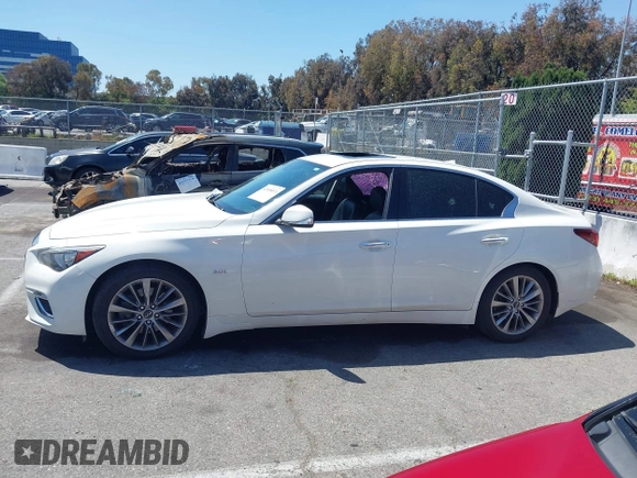 2019 Infiniti Q50 Luxe z VIN JN1EV7AP7KM518276, wystawiony jako IAAI lot #42148033 z przebiegiem 56 720 mil mil oraz . Historia ofert i sprzedaży dostępna na DreamBid. Obrazek 14.