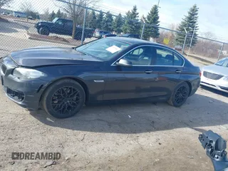 2014 BMW 5 Series 535i xDrive with VIN WBA5B3C52ED534784, listed as a IAAI auction lot 41875567 with 128,533 mi miles and . Bid and sale history available at carsss.com. Image 14.