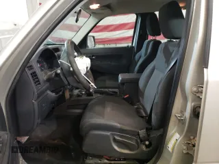 2009 Jeep Liberty Sport with VIN 1J8GN28K99W532027, listed as a Copart auction lot 48662355 with 120,946 mi miles and Salvage Title. Bid and sale history available at DreamBid. Image 7.