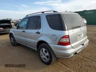 2003 Mercedes-Benz M-Class 3.7L with VIN 4JGAB57E33A421993, listed as a Copart auction lot 71800334 with 210,086 mi miles and Salvage Title. Bid and sale history available at carsss.com. Image 2.