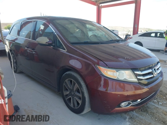2014 Honda Odyssey Touring with VIN 5FNRL5H90EB080889, listed as a IAAI auction lot 42085305 with 123,286 mi miles and . Bid and sale history available at carsss.com. Image 13.