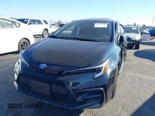 2023 Toyota Corolla Hybrid LE with VIN JTDBCMFE6P3001785, listed as a IAAI auction lot 41337266 with 25,829 mi miles. Bid and sale history available at carsss.com. Image 17.