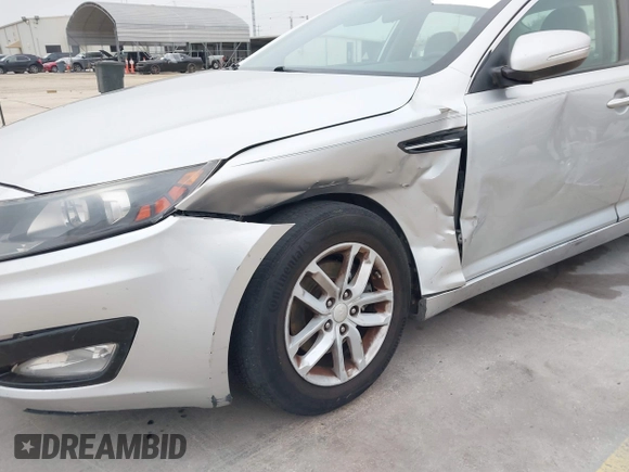 2013 Kia Optima LX with VIN KNAGM4A79D5377485, listed as a IAAI auction lot 41290306 with 172,253 mi miles. Bid and sale history available at carsss.com. Image 6.