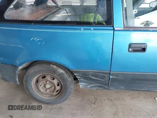 1990 Geo Metro z VIN 2C1MS2469L6015529, wystawiony jako IAAI lot #41902168 z przebiegiem 95 772 mil mil oraz . Historia ofert i sprzedaży dostępna na DreamBid. Obrazek 12.