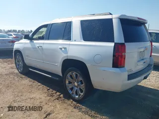2020 Chevrolet Tahoe LT with VIN 1GNSCBKC9LR196546, listed as a IAAI auction lot 41661308 with 132,714 mi miles and . Bid and sale history available at DreamBid. Image 3.